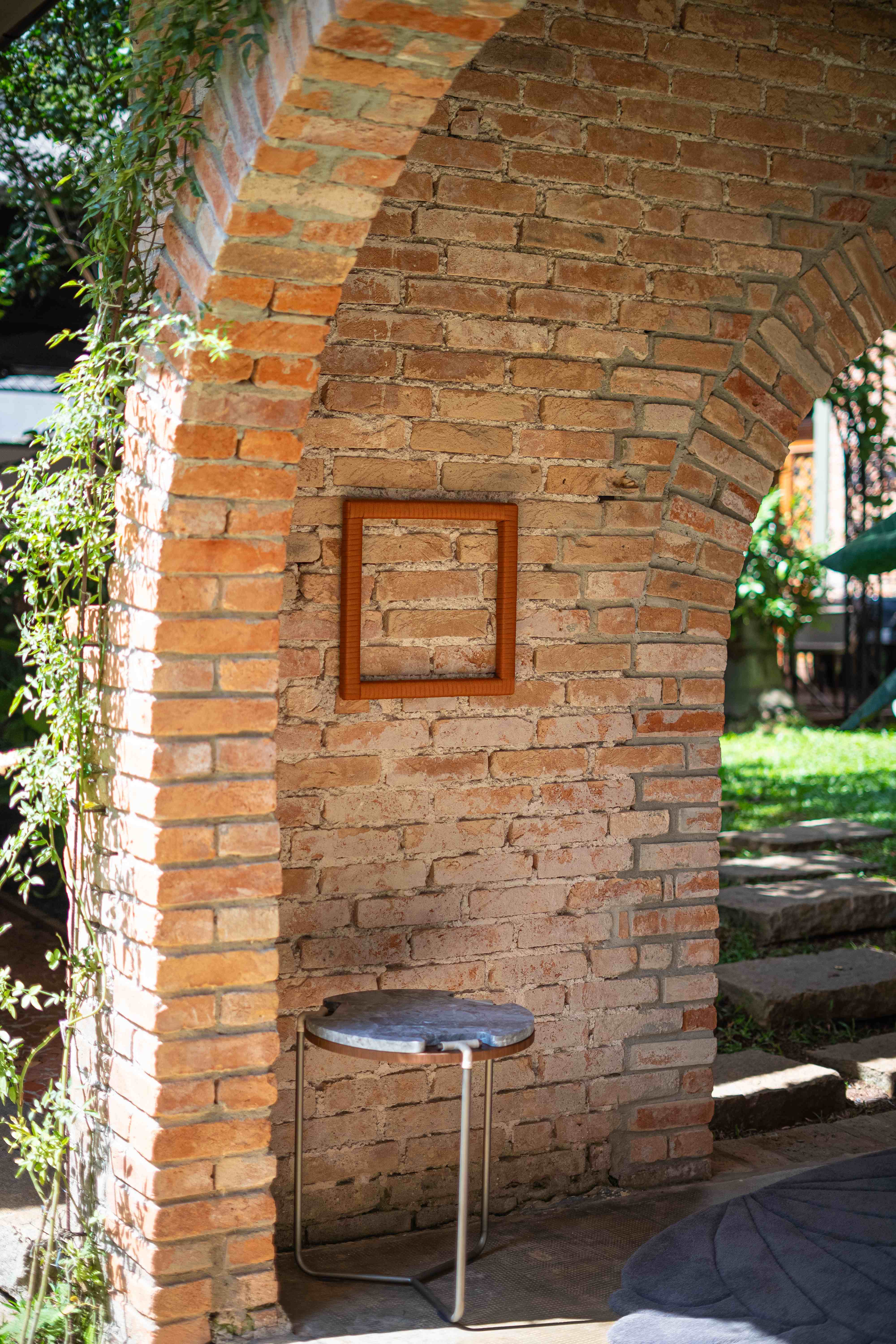 Detalhe arquitetônico - Arco de tijolos com obra